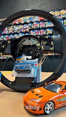 Carbon Fiber Steering Wheel Nissan 350Z Twill 245 + Gold/Pink Forged Carbon