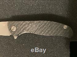 Shirogorov Hati Frame Lock Knife Twill Carbon Fiber M390 on old school washers
